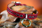 3/4" Handmade leather BDSM collar with filigree embossing and nickel plated hardware. Color: Oxblood. Angle