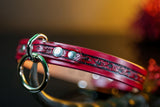 3/4" Handmade leather BDSM collar with filigree embossing and nickel plated hardware. Color: Oxblood. Close up front.